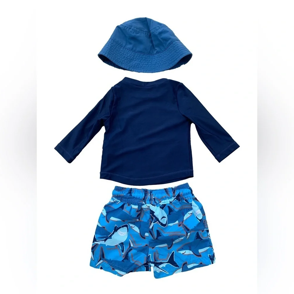 Carter’s Three Piece Swim Set with Bucket Hat, Rash Guard and Shark Swim Trunks